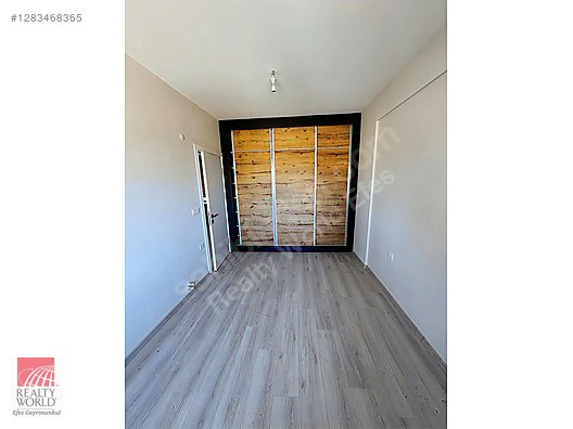 REALTY WORLD EFES'TEN İLKİM İNVEST CADDE KONUTLARINDA SIFIR 1+1 - Satılık Daire İlanları sahibinden.com'da