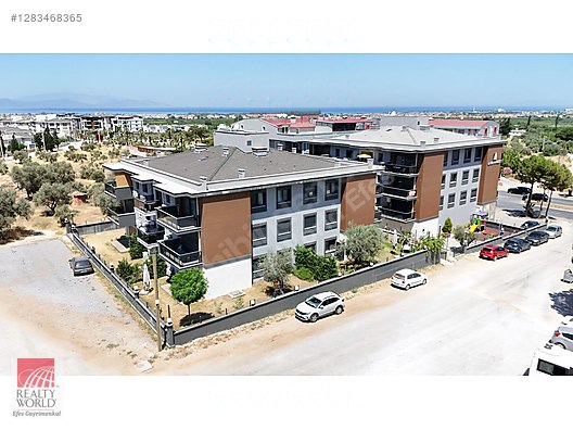 REALTY WORLD EFES'TEN İLKİM İNVEST CADDE KONUTLARINDA SIFIR 1+1 - Satılık Daire İlanları sahibinden.com'da