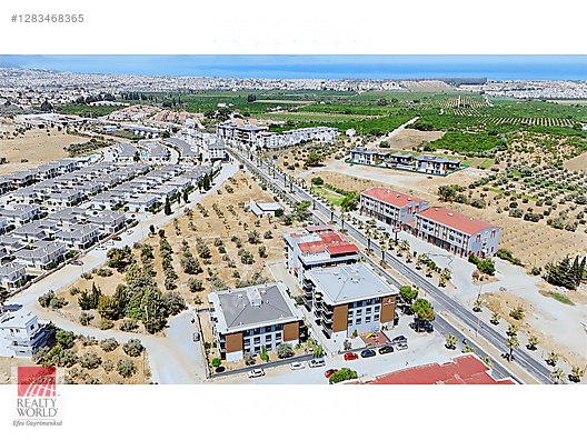 REALTY WORLD EFES'TEN İLKİM İNVEST CADDE KONUTLARINDA SIFIR 1+1 - Satılık Daire İlanları sahibinden.com'da