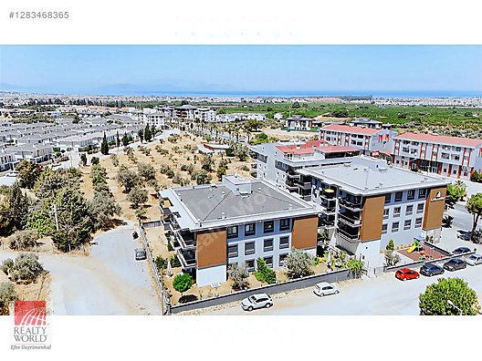 REALTY WORLD EFES'TEN İLKİM İNVEST CADDE KONUTLARINDA SIFIR 1+1 - Satılık Daire İlanları sahibinden.com'da