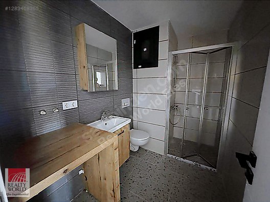 REALTY WORLD EFES'TEN İLKİM İNVEST CADDE KONUTLARINDA SIFIR 1+1 - Satılık Daire İlanları sahibinden.com'da