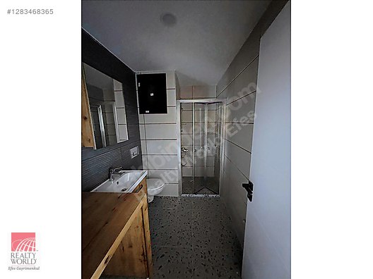 REALTY WORLD EFES'TEN İLKİM İNVEST CADDE KONUTLARINDA SIFIR 1+1 - Satılık Daire İlanları sahibinden.com'da