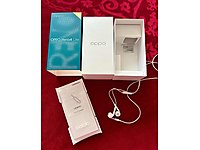 Oppo Reno 4 kutusu ve kulaklığı