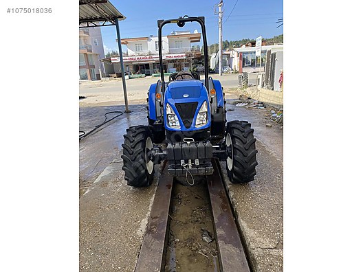 New Holland / New Holland .b at  - 1075018036