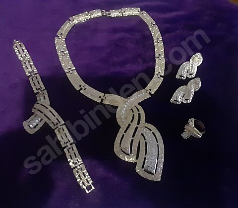 takı seti kelepçe yüzük saat