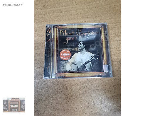 MURAT GÖĞEBAKAN YARALI CD SIFIR ORJ AMBALAJINDA ESKİ BASKI - Müzik