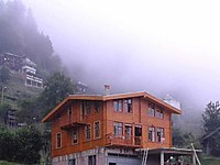 Özel Tasarım Doğal Ahşap Evler