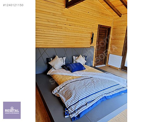 BAĞLI KÖYÜNDE SATILIK 5118 M2 İMARLI YOLA CEPHE ARSA VE VİLLA