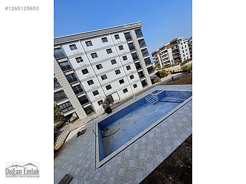 DOĞAN EMLAK 2 + 1 kapalı mutfak site içi havuzlu...