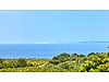 DOĞAYLA BAŞ BAŞA, DENİZ VE BOZCAADA MANZARALI 5.170 m² HUZUR!