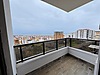 REVİZYON'DAN TOPLU KONUT BULVARINDA DENİZ MANZARALI 1+1 DAİRE