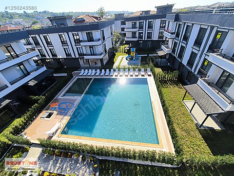 KARASU AZİZİYEDE HAVUZLU SİTEDE ARA KAT HAVUZ CEPHELİ 2+1 DAİRE