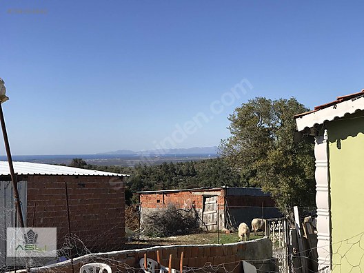 GEYİKLİ KARADAĞ KÖYÜNDE DENİZ MANZARALI HEMEN OTUR KÖY EVİ Satılık