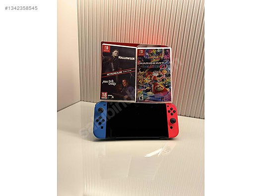 Nintendo Switch OLED 64GB Temiz Orjinal Çantalı + 2 oyun