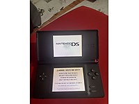 Nintendo DS Lite + 5 Oyun Kartı + Taşıma Çantası + Orijinal Şarj