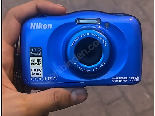 Nikon COOLPIX 2100 と　Olympus C-740 Compact / Nikon / Coolpix W100 / NİKON SUGECİRMEZ DARBEYE TOZA