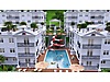 YEŞİLİN VE DENİZİN BULUŞTUĞU SİTEDE GENİŞ BALKON VE BAHÇELİ 2+1