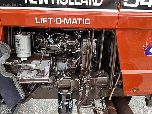 Machinery / Agricultural Machines / Tractors / New Holland / 54C