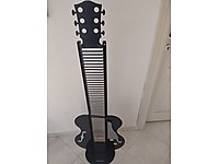 Gitar Biçimli CD-DVD Rafı - Metal (demonte)