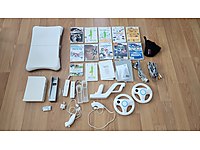 Nintendo Wii Konsol + fit board + Kontrolcüler + UFC + Oyunlar