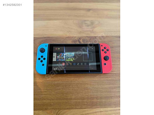 Nintendo Switch V2 HAC-001(-01) + 4 Oyun + 128GB + Dock + Çanta on