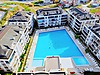 DENİZE SIFIR OLİMPİK HAVUZLU SİTEDE DENİZ MANZARALI SATILIK 4+1