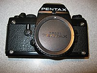 PENTAX LX 35 mm. SLR Analog Kamera ve orjinal taşıma kayışı