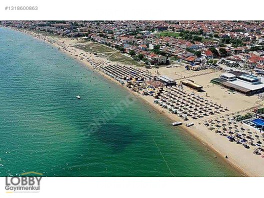 SAROZ KÖRFEZİ'NDE DENİZİN YANI BAŞI 274 m2 SATILIK İMARLI ARSA