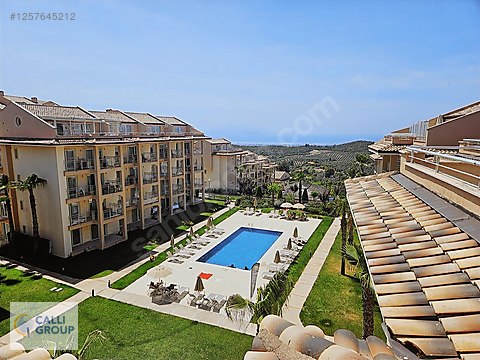 KUŞADASI GOLF RESORT'TE SATILIK 3 BALKONLU 2+1...