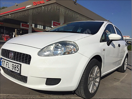 Fiat Grande Punto 1.4 8V, model year 2006-, silver, driving