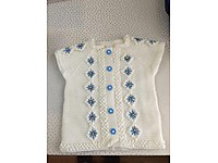 El örgü bebek yeleği