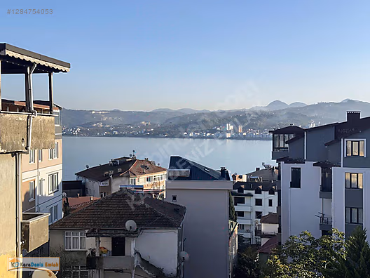 KARADENİZ EMLAKTAN BURUNUCUNDA MUHTEŞEM DENİZ MANZARALI DAİRE #1284754053