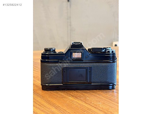 35 mm SLR / Canon / Canon AE-1 Black + Canon FD 50mm f/1.4 on
