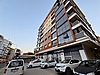 KONAK'TA ANACADDE ÜZERİNDE SATILIK YENİ/GENİŞ 3+1 DAİRE