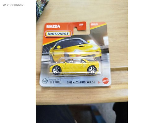 matchbox 1985 Porsche 911 rally-1992 mazda Autozam AZ-1 on