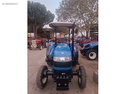 Machinery / Agricultural Machines / Tractors / New Holland / 54C