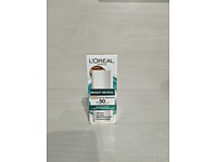 L'Oreal Paris Bright Reveal Medium Renkli Fluid Yüz Güneş Kremi