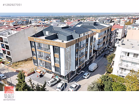 REALTY WORLD EFES'TEN DAVUTLAR MERKEZDE LÜKS 2+1...