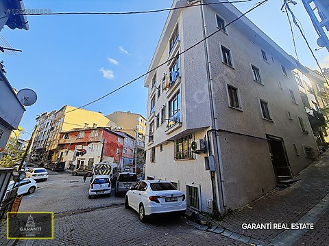 GARANTİ GAYRİMENKUL'den DEFİNE SOKAKTA İSKANLI YENİ BİNADA! - Satılık ...
