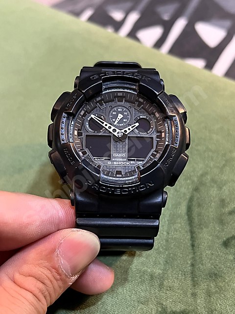 Casio GA-100-1A1DR G-Shock Erkek Kol Saati